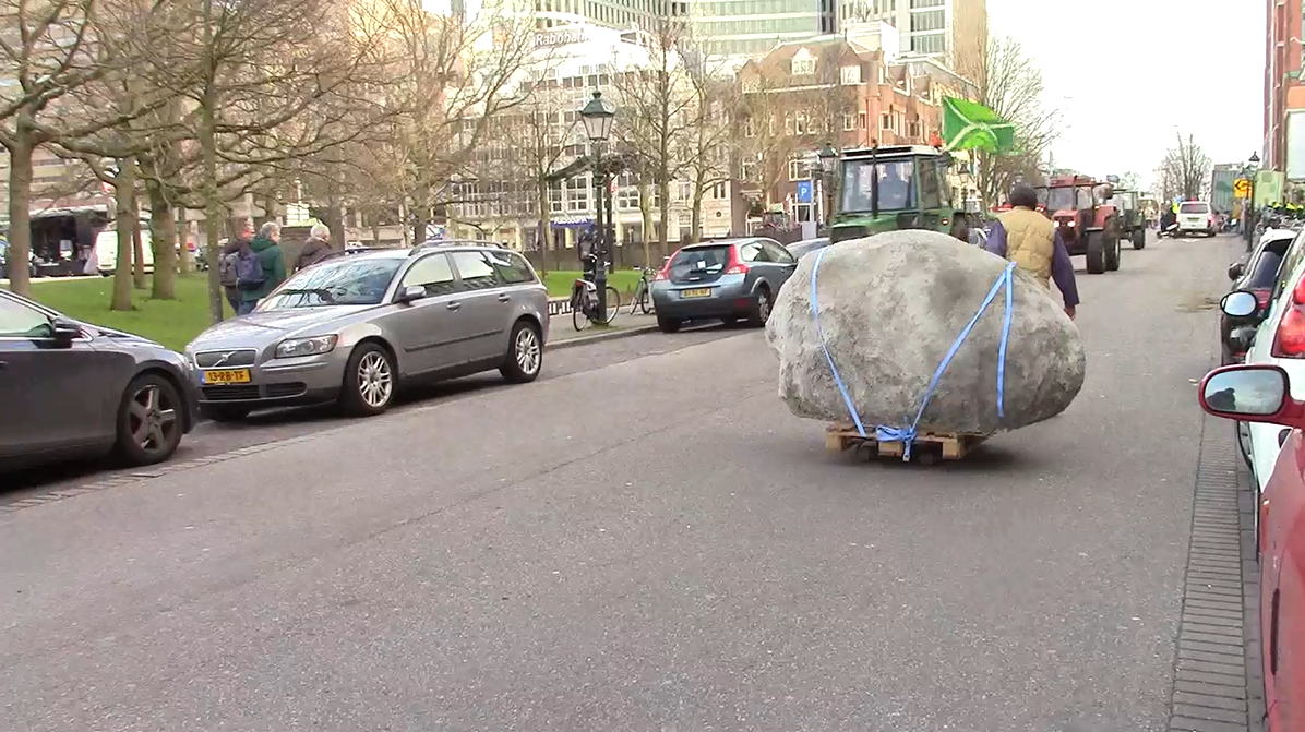 screenshot of video documentation of the tranportation of the rock